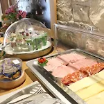 Отель At The Grape